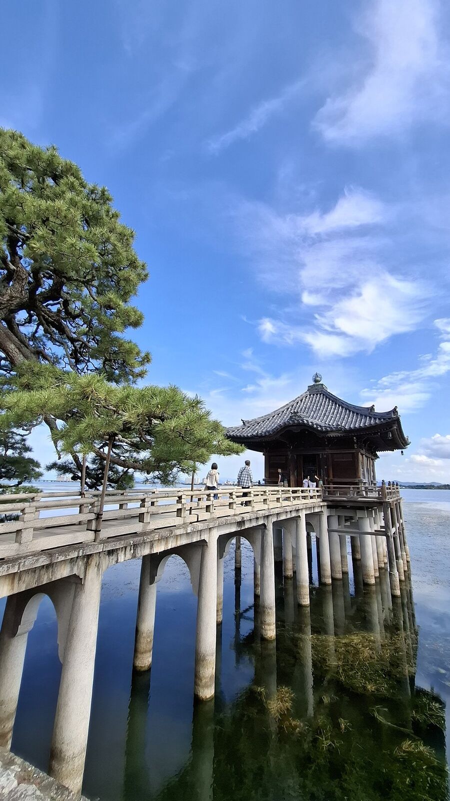 Low angle view of the Ukimido bridge and pavilion with dramatic cloud sky above