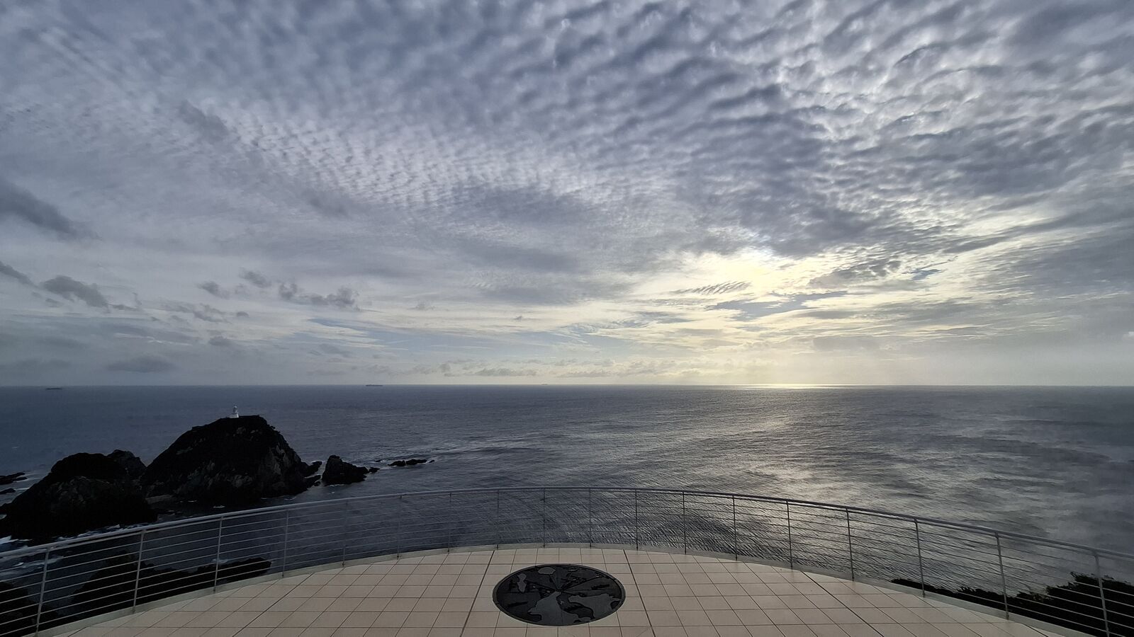 Compass rose mosaic on the observation platform floor showing distances to other Japanese capes and landmarks