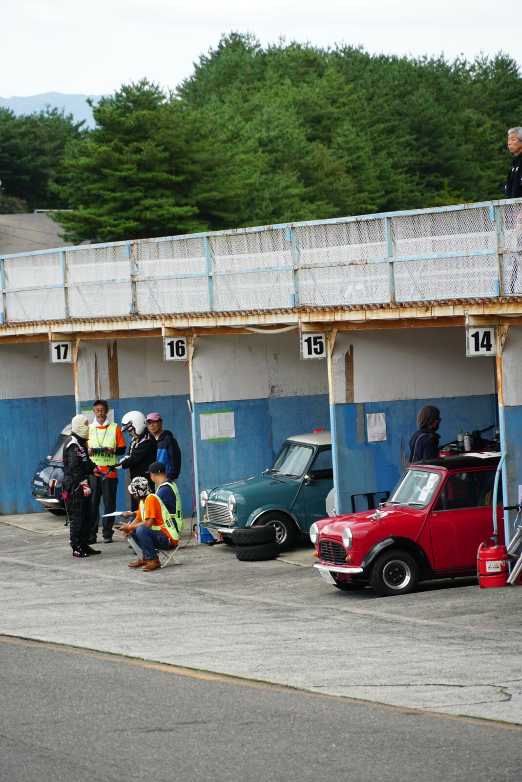 Sports cars lined up in the parking area at the car gathering