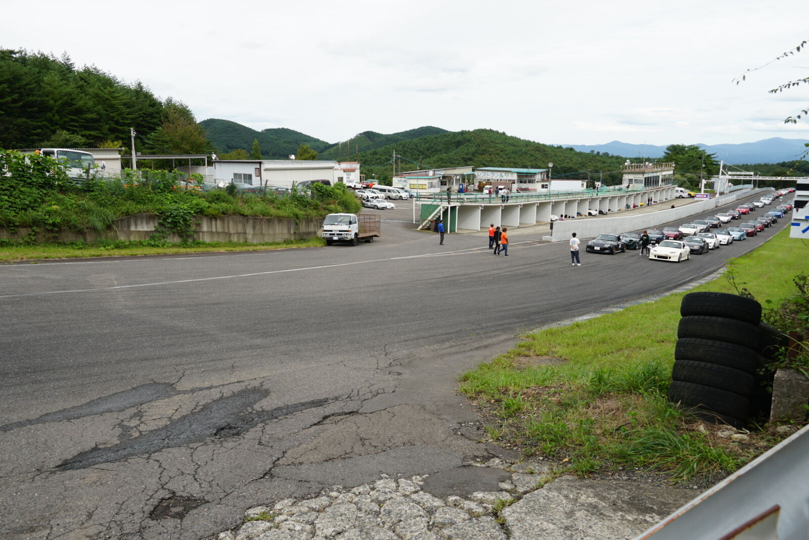 Overview of the car gathering with rows of vehicles in the lot
