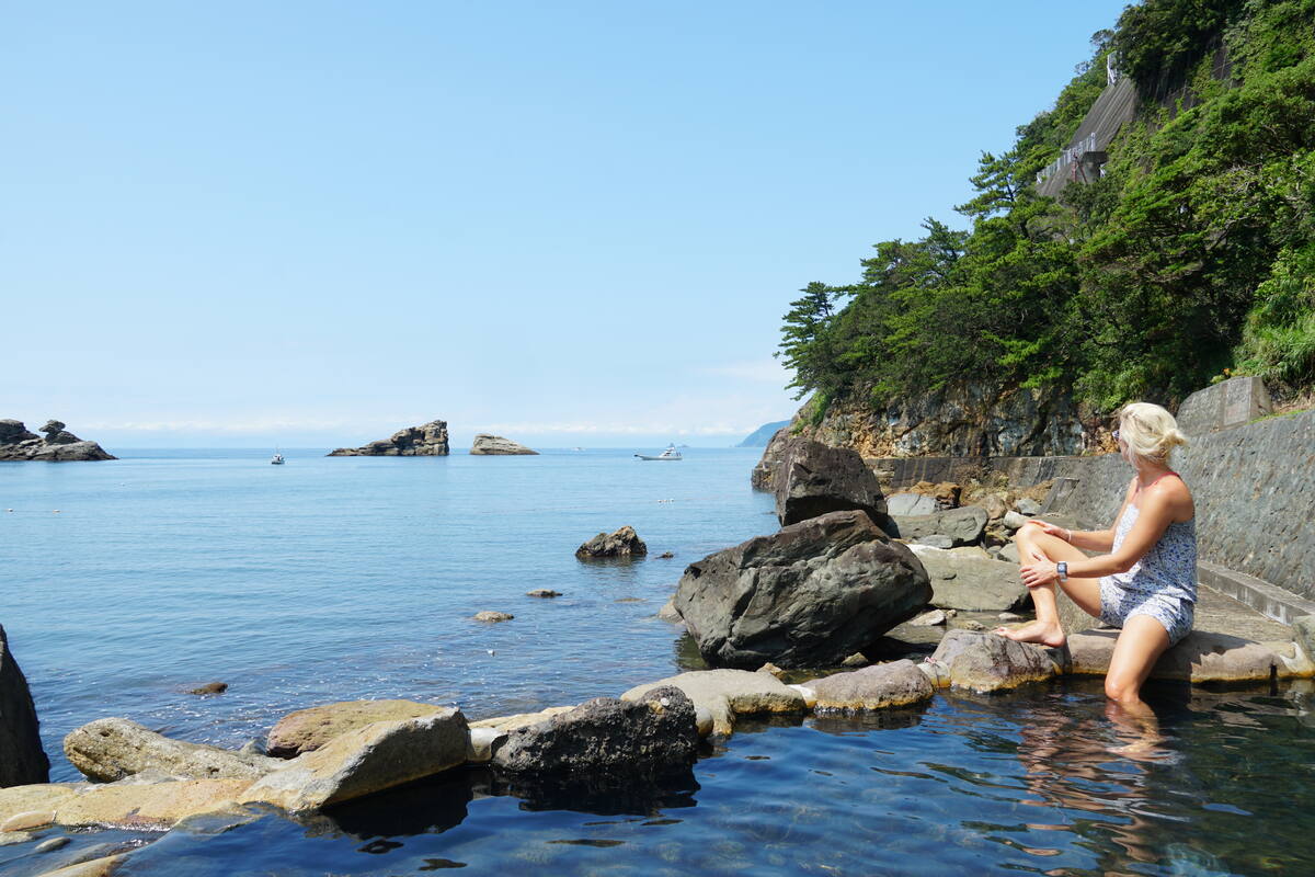 Summer landscape view of Suruga Bay and Heda fishing village with pine-covered coastline