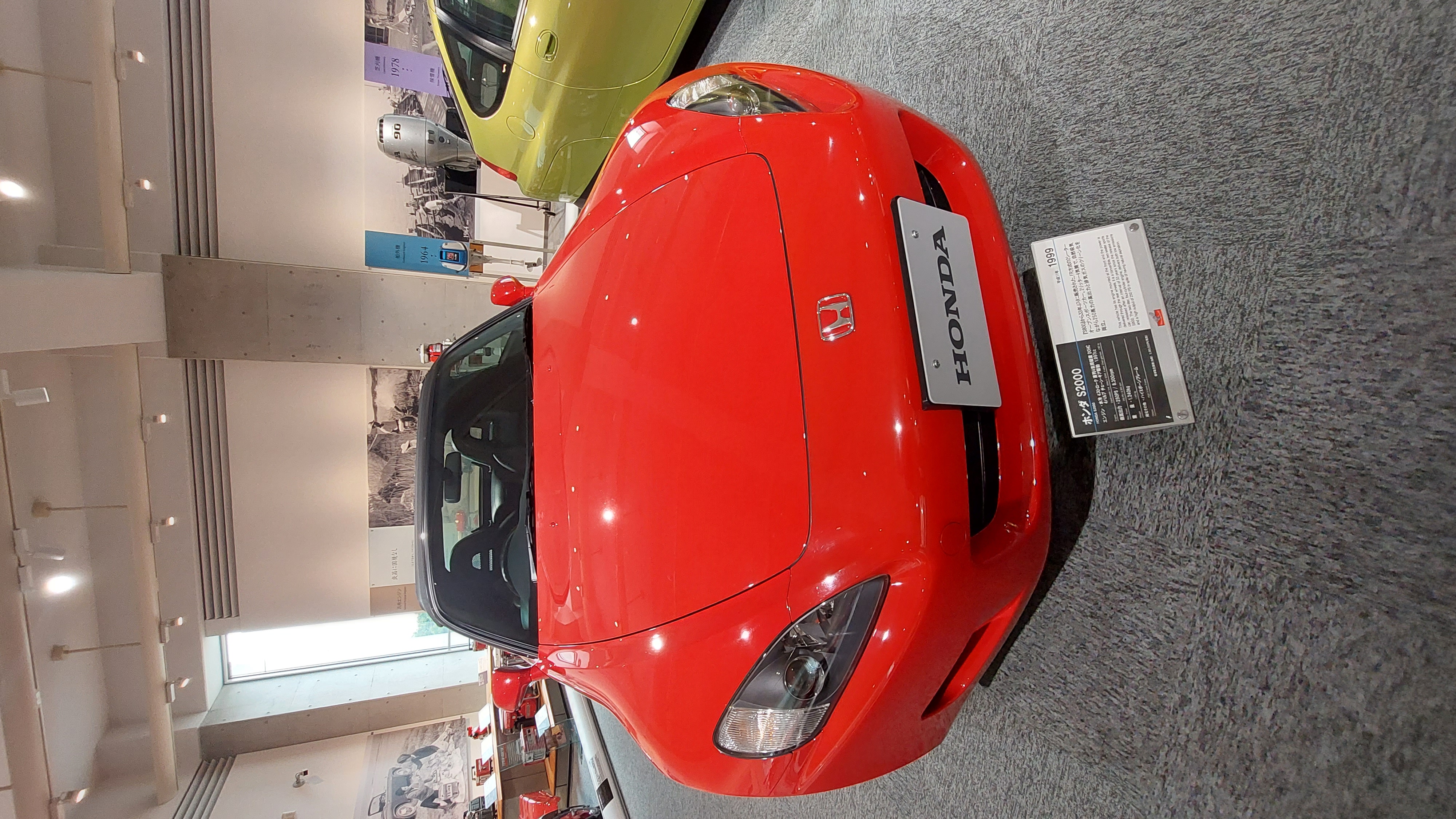 Red Honda S2000 on display, front three-quarter view