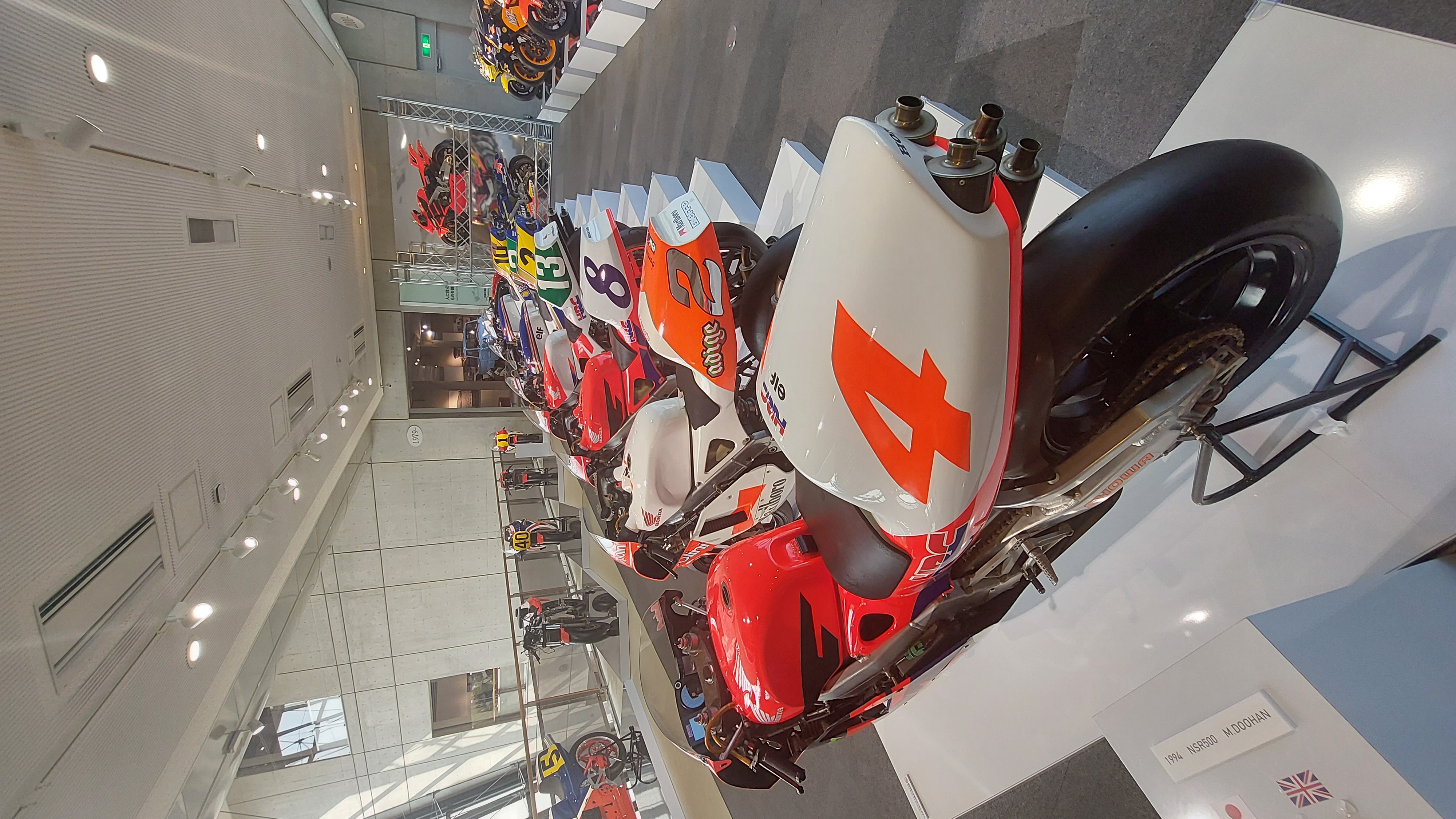 Close-up of MotoGP bikes with number 4 in the foreground, the raw aggression of purpose-built racing machines