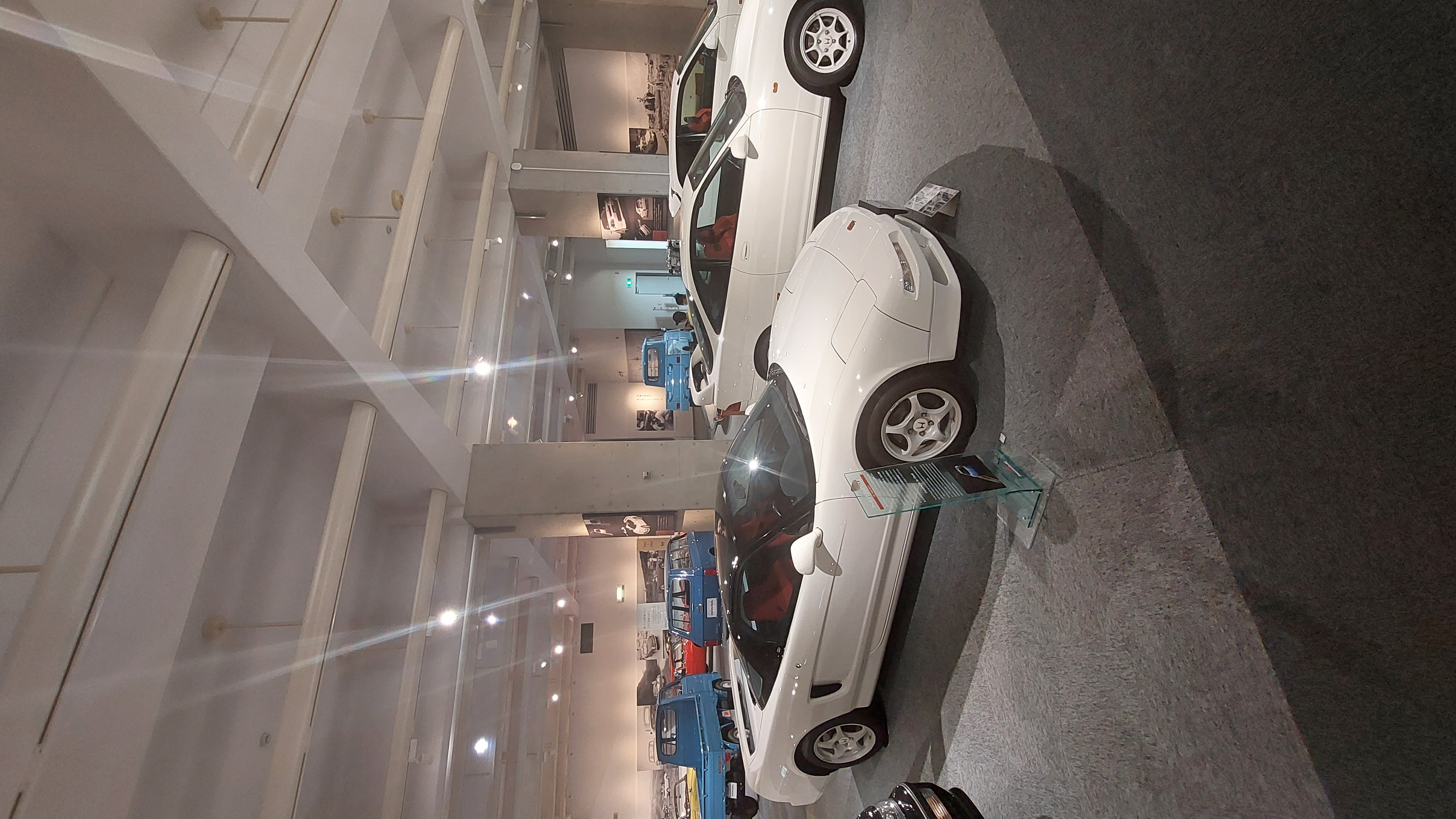 White Honda NSX on the museum floor, the mid-engine supercar that embarrassed Ferrari