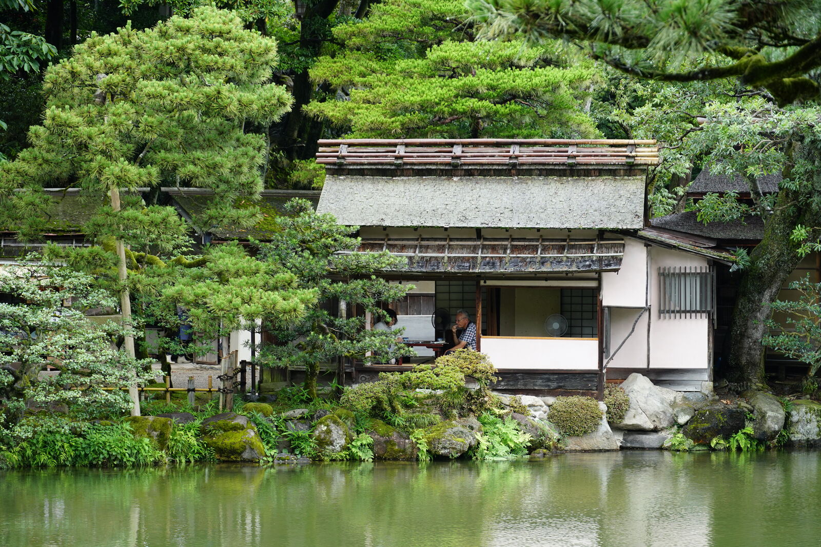Close-up view into the tea house with traditional matcha preparation visible
