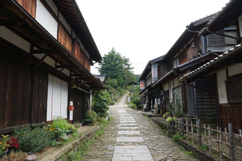 Stone-paved street through the post town of Tsumago on the Nakasendo trail