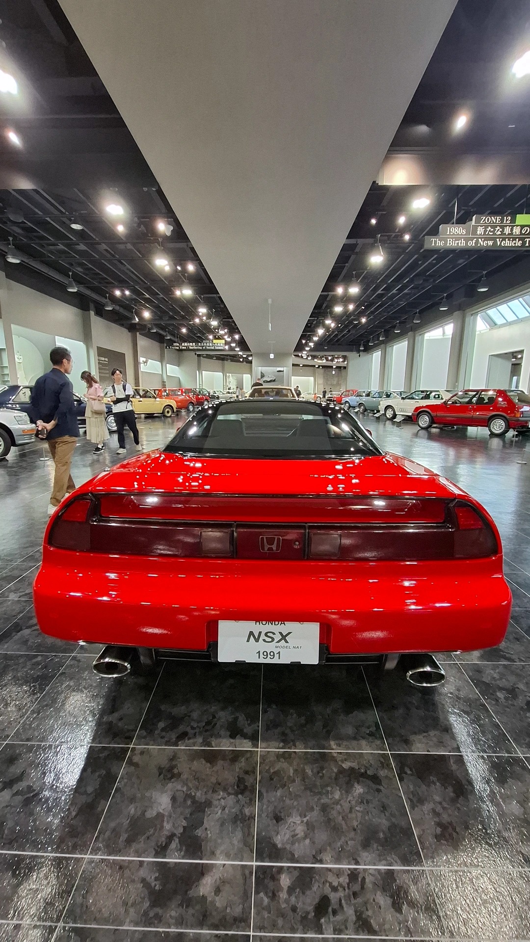1991 Honda NSX in red, rear view in the Toyota Museum, the mid-engined supercar that terrified Ferrari, sitting in a rival's house