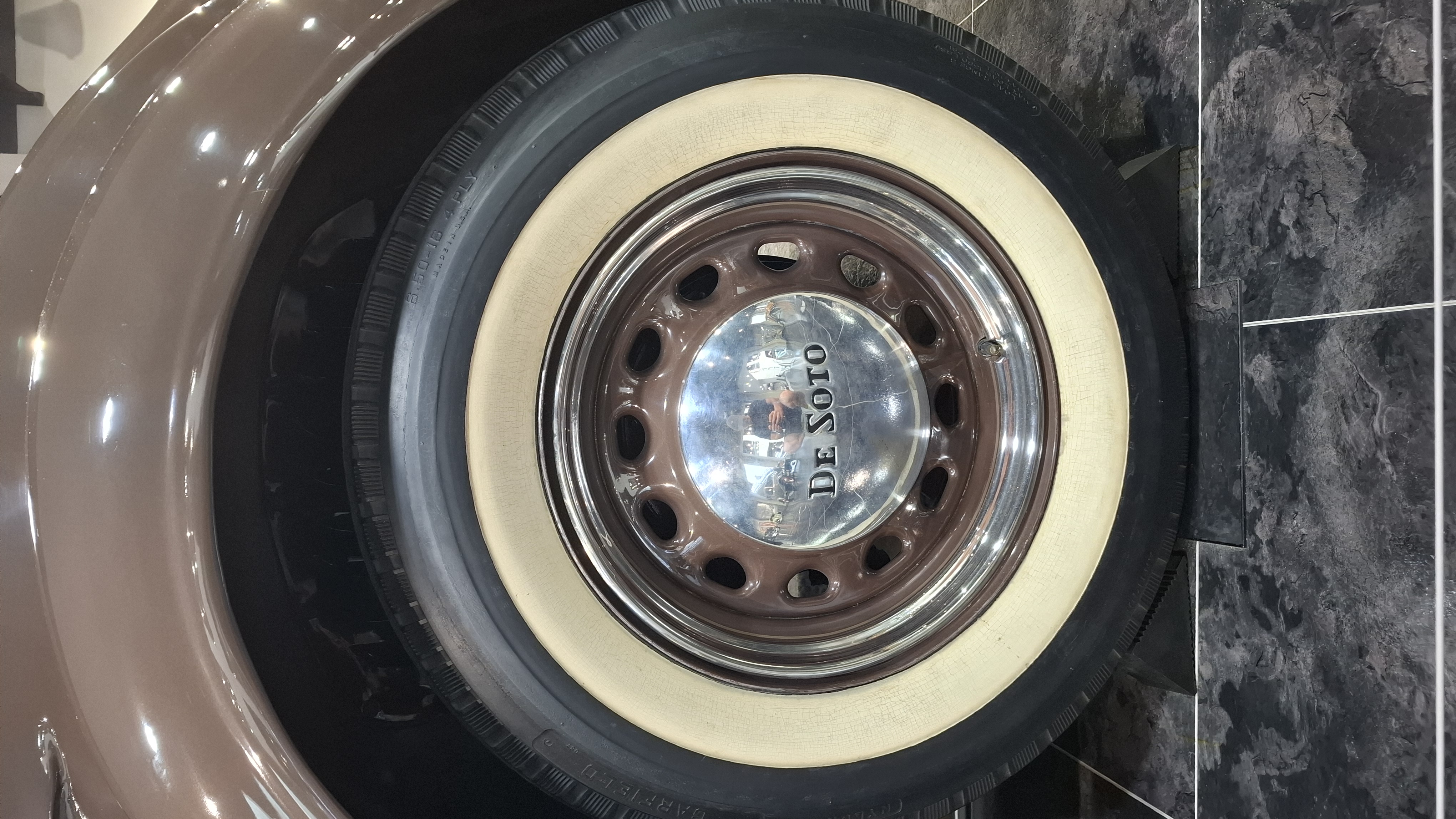DeSoto whitewall tire and chrome hubcap detail, the craftsmanship of Depression-era American cars