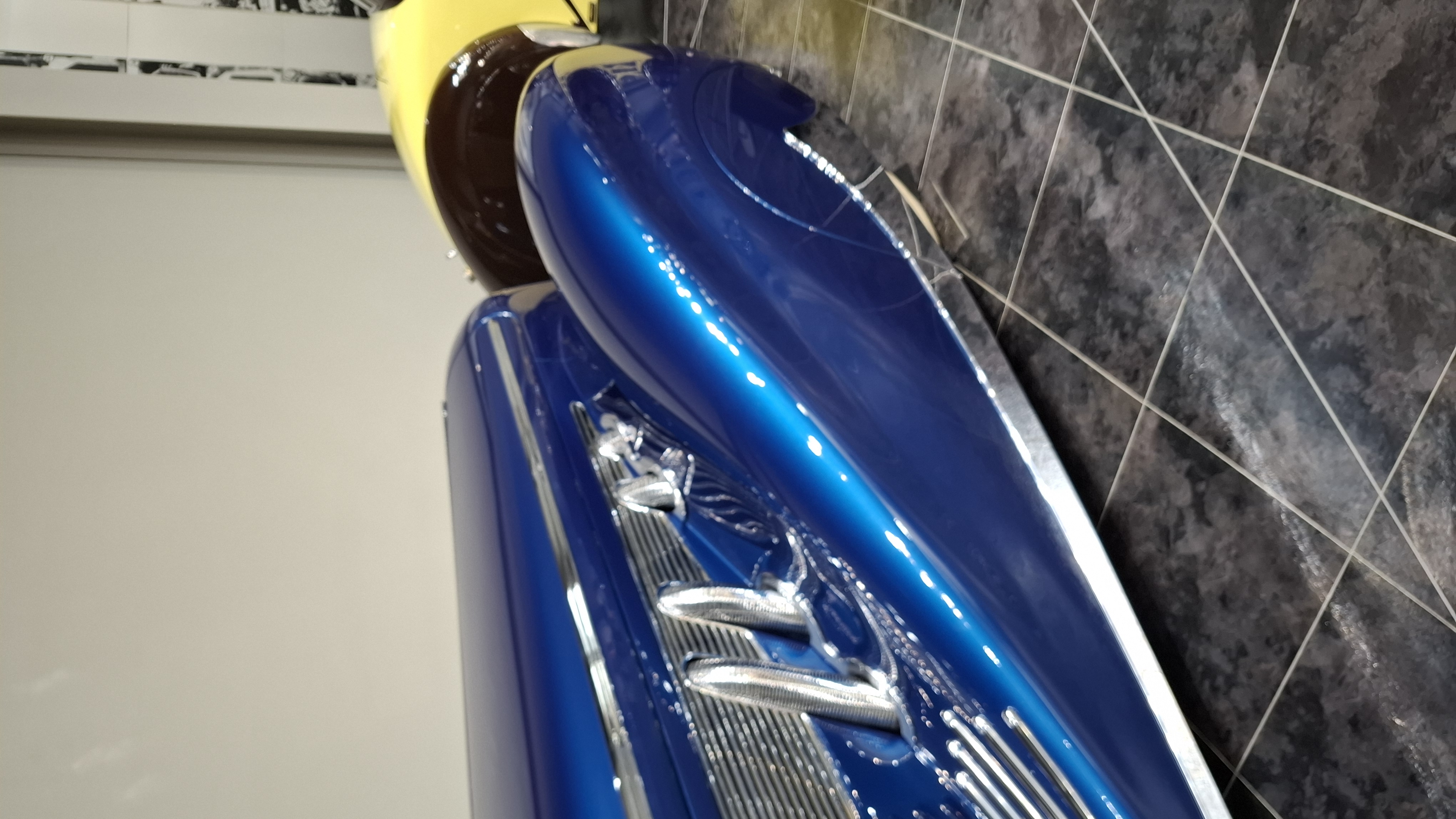 Delahaye chrome side vents detail, three horizontal slashes in the bodywork