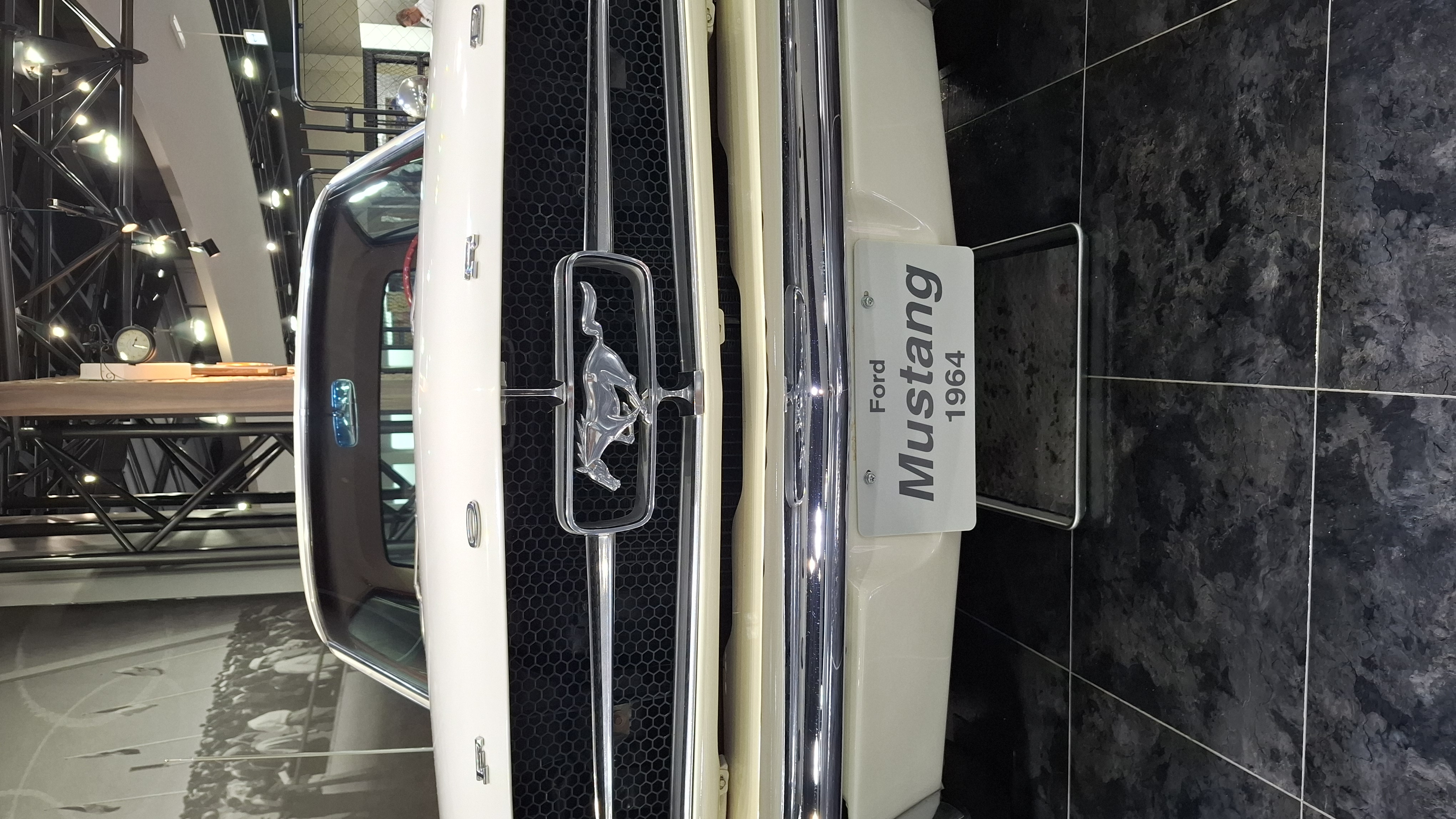 Mustang grille badge extreme close-up, the running horse in chrome