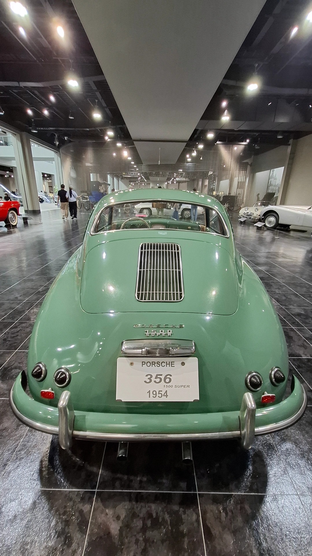 1954 Porsche 356 in mint green, rear view with the perfect proportions and model plate